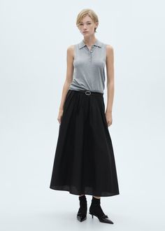 Pleated midi skirt - Woman | MANGO USA Chic Midi-length Cotton Maxi Skirt, Chic Cotton Maxi Skirt Midi Length, Chic Cotton Maxi Skirt In Midi Length, Elegant Cotton Midi Skirt, Cotton Midi-length Pleated Skirt For Work, Cotton Pleated Midi Skirt For Work, Cotton Voluminous Maxi Skirt For Work, Elegant Cotton Asymmetrical Maxi Skirt, Chic Cotton Midi-length Pleated Skirt