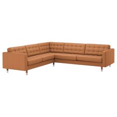 a tan leather sectional sofa with wooden legs and backrests on an isolated white background