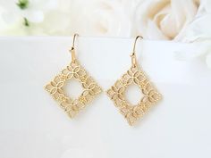 These dainty filigree earrings, have an elegant floral design. They will compliment a variety of attire, and are lightweight, making them great for everyday wear!  Product details: * 18k gold plated ear wires; Lead and nickel free * 18k gold plated filigree charm  - Length: 1.25 inches - Width:  .75 inches ❤ You can click here to see more unique jewelry from Flutterbird: https://www.etsy.com/shop/FlutterbirdCo My goal is to provide every customer with exceptional service. Please message me if you have any questions. Thank you for supporting my small business!  Please visit my F.A.Q. and shop policy sections for additional information. Elegant Gold Flower Earrings Nickel Free, Elegant Flower Drop Earrings As Gift For Her, Elegant Flower Drop Earrings For Her, Elegant Hypoallergenic Earrings As Gift For Her, Elegant Rose Gold Filigree Earrings, Gold Filigree Flower Earrings For Gift, Elegant Flower-shaped Hoop Earrings Gift, Rose Gold Filigree Drop Earrings, Elegant Nickel-free Earrings As A Gift For Her