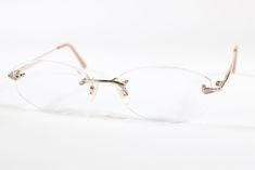 Brand: Jaeger Model: 228 Colour: Gold Rim Type: Rimless Material: Titanium Arm size: 135 mm Lenses: 50 mm Bridge: 16 mm Frame Shape: Country of manufacturer: Lens height: Lens Width: NB: THESE ARE PREVIOUSLY USED GLASSES FRAMES. THEIR CONDITION IS RATED AS GOOD OVERALL, REPRESENTING A HIGH STANDARD FOR PRE OWNED FRAMES. WHILE NOT NEW THEY MAINTAIN A SOLID QUALITY. PLEASE BE AWARE THAT MINOR SIGNS OF PRIOR USE MAY BE PRESENT, YET THESE ARE OFTEN ALMOST UNDETECTABLE TO THE EYE. TO THOROUGHLY ASSESS THEIR CONDITION, WE RECOMMEND UTILISING THE ZOOM FEATURE ON THE PROFESSIONALLY CAPTURED PHOTOGRAPHS INCLUDED. ADDITIONALLY, PLEASE REMEMBER THAT YOUR PURCHASE ENCOMPASSES THE FRAMES ONLY, AND THE LENSES WILL REQUIRE REPLACEMENT. THESE ARE FRAMES ONLY AND CASES, LENSES AND CLOTH ARE NOT INCLUDED. R Glasses Frames, Eyeglasses Frames, Lenses, Health And Beauty, Frame, Gold