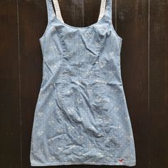 Hollister Denim Fitted Palm Tree Pattern Dress. Size 5 Nwot 24" Front Length 30" Waist Dm To Bundle//Make Offer Fitted Light Blue Cotton Mini Dress, Fitted Washed Blue Dress For Summer, Light Blue Cotton Denim Summer Dress, Light Blue Casual Cotton Denim Dress, Casual Light Blue Cotton Denim Dress, Light Blue Cotton Denim Dress Casual, Medium Wash Fitted Cotton Dresses, White Fitted Denim Dress, Fitted White Denim Dress