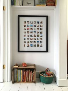 a bookshelf filled with lots of books next to a wall mounted book shelf