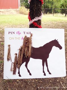 a horse party sign on the side of a tree