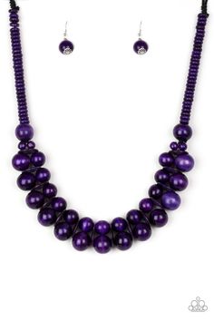 Brushed in a distressed finish, vivacious purple wooden beads and discs join below the collar for a summery look. Features a button loop closure.

Sold as one individual necklace. Includes one pair of matching earrings. Pink Jewels, Wooden Bead Necklaces, Purple Necklace, Wooden Necklace, Cover Girl, Wood Necklace, Paparazzi Accessories, Girls Necklaces, Paparazzi Jewelry