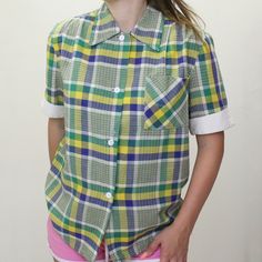 Vintage 70s Blouse! Button up plaid short cuffed sleeve tee! Classic versatile piece. fits approx. a women's L  has some lightened spots (photographed) Bust & Waist: 42" yellow and green plaid BD 4.5 oz. Plaid Short Sleeve Preppy Tops, Plaid Camp Collar Tops With Relaxed Fit, Preppy Short Sleeve Plaid Tops, Plaid Collared Top With Preppy Style, Preppy Collared Plaid Tops, Preppy Plaid Collared Top, Preppy Plaid Top With Button Closure, Retro Gingham Tops With Button Closure, Retro Gingham Top With Button Closure