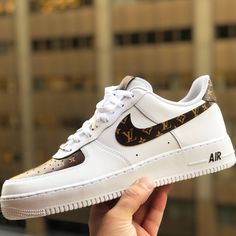 Elevate your sneaker game with our Custom Air Force 1 Brown LV. Made with premium materials and personalized LV design, these shoes add a touch of luxury to your style. Take comfort in the high-quality construction and stand out in a sea of ordinary sneakers. - Brand new with original box.- Each pair is personally handmade in US- Free Worldwide shipping.- Each pair is 100% hand painted/hand crafted, painted with high quality Angelus leather acrylic paint. Topped with a clear coat for waterproof and scratchproof.