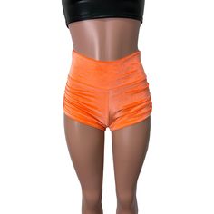 Sexier and more flattering! Our classic booty shorts made in stretch orange velvet with ruching on each side. Made to flatter your figure and move with you. The standard inseam is 2.5" - but can be customized. Choose between low-rise, mid-rise and high-waist (high-waist shown in photos). Fitted Short Length Orange Bottoms, Fitted Short Orange Bottoms, High Waist Fitted Orange Shorts, Fitted High Waist Orange Shorts, Fitted Orange Workout Bottoms, Orange Fitted High Waist Shorts, Orange Fitted Workout Bottoms, Stretch Orange Biker Shorts, Fitted High-waisted Orange Shorts