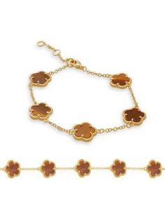 From the Flower Collection..Tiger eye stone.14K goldplated brass.Lobster clasp.Imported.SIZE.Length, about 6.75'-8'.Diameter, about 3.375'-4'.Click here for a Guide to Jewelry & Watches.From the Flower Collection.Tiger eye stone14K goldplated brassLobster claspImportedSIZELength, about 6.75'-8'Diameter, about 3.375'-4'.Click here for a Guide to Jewelry & Watches.Chains & Strands.Jewelry.Women's.Bracelets Classic Gold Jewelry With Flower Charm, Classic Gold Jewelry In Flower Shape, Formal Adjustable Flower Shape Jewelry, Gold Bracelet With Flower Charm And Round Shape, Gold Bracelet With Flower Charm, Gold Flower Shaped Jewelry With Gemstone, Gold Flower-shaped Gemstone Jewelry, Gold Flower Gemstone Jewelry, Luxury Gold Flower Bracelet