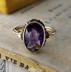 Beautiful 1950s vintage silver amethyst ring, US Size 6 1/2, in good vintage condition. Box on the photos not included! Diameter: approx. 14 mm (0.5 inch) Material: 925 silver, amethyst total weight: 3 g US Size: approx. 6 1/2 (EU size 53 1/2) A stunning religious shop well worth a visit ... https://etsy.me/2NNNK4g Vintage Silver Amethyst Ring Gift, Adjustable Vintage Sterling Silver Amethyst Ring, Vintage Cabochon Amethyst Ring Gift, Antique Sterling Silver Hallmarked Amethyst Ring, Vintage Silver-toned Amethyst Ring Gift, German Silver, Multi Stone, 1950s Vintage, Multi Stone Ring