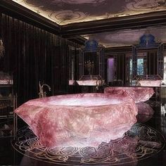 a large bathtub sitting in the middle of a room