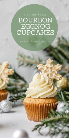 two cupcakes with white frosting on top and christmas decorations in the background