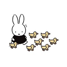 a rabbit is surrounded by little birds