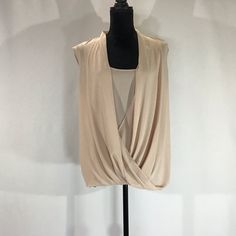 Bcbgmaxazria Rachel Sleeveless Blouse Size Large Color: Bare Pink New With Tags Chic Stretch Tank Blouse, Sleeveless Stretch Blouse For Layering, Spring Evening Vest In Sleeveless Blouse Style, Spring Evening Tank Blouse, Chic Beige Tank Blouse, Beige Sleeveless Top For Layering, Chic Beige Tank Top For Layering, Chic Beige Tank Vest, Elegant Beige Sleeveless Tank Top