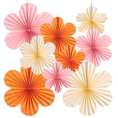 several paper fans are arranged on a white background