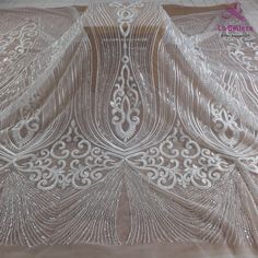 Price: The price is for 1 yard. if you buy more than 1 yard ,it won't be cut. will come in one piece the longest is 20 yards. Material: polyester,sequins,beads Fixed Wide : 130 cm or 51 inches. color:off white Want to see other colors and more similar Beading lace fabrics come to: https://www.etsy.com/shop/Randyfabrics?ref=hdr_shop_menu&section_id=14192305 Shipping: Choose the shipping way you need, if you want package shipped by express,please note the phone number on order. Use for Dress,c White Dress Lace, Wedding Gown Lace, Off White Wedding, White Wedding Gown, Off White Wedding Dresses, Off White Dress, Beaded Fabric, Embroidered Wedding Dress, White Lace Wedding Dress