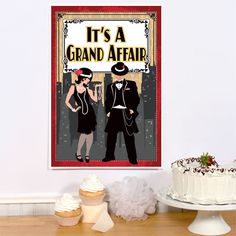 there is a cake and cupcakes on the table with it's a grand affair sign