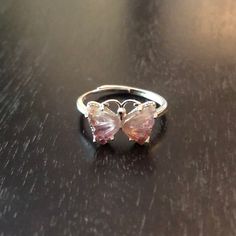 This Is A Beautiful Natural Carved Tourmaline Butterfly Ring Set In Sterling Silver. The Wings Are Like A Amber Color That Start With A Darker Pink From Bottom Of Wings To A Litter Pink In Middle And Then A Light Green At The Top Tip Of The Wings. Just A Stunning Ring. The Ring Is Adjustable. The Butterfly Is 1/2”X1/2”This Is New Without Tags. Pink Sterling Silver Crystal Ring With Gem, Pink Sterling Silver Crystal Open Ring, Pink Sterling Silver Open Ring Jewelry, Adjustable Pink Sterling Silver Jewelry, Adjustable Sterling Silver Pink Jewelry, Pink Sterling Silver Crystal Ring, Nickel Free Pink Promise Ring, Adjustable Pink Crystal Ring For Anniversary, Elegant Nickel-free Pink Ring