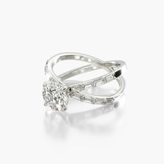 a diamond ring on a white background