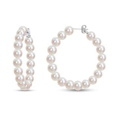 Show your elegance and style with these beautiful freshwater cultured pearl hoop earrings in silver. Fashioned in sterling silver Each earring showcases a row of lustrous 6.0-6.5mm freshwater cultured pearls connected from the post to the back for a hoop-like look. These earrings secure comfortably with friction backs. Elegant Sterling Silver Hoop Earrings With Round Beads, Classic Pearl White Pearl Hoop Earrings, Classic Pearl White Hoop Earrings, Classic Hoop Pearl Earrings In Sterling Silver, Classic Sterling Silver Hoop Pearl Earrings, Classic Silver Hoop Pearl Earrings, Classic Pearl Hoop Earrings For Anniversary, Classic Small Hoop Pearl Jewelry, Classic Silver Pearl Hoop Earrings