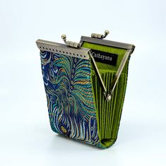 "This cute card holder is a lovely gift for your friends and family as well. Accordion Style, Kiss Clasp Frame, Brocade card holder with RFID protection Hold up to 8 cards 4.75\" H x 3\" W x 1\" D" Rectangular Clutch With Card Slots As Gift, Handmade Rectangular Card Holder Gift, Handmade Rectangular Card Holder As Gift, Green Rectangular Wallet For Gift, Green Rectangular Wallet Gift, Handmade Bifold Card Holder For Gift, Handmade Green Coin Purse As Gift, Handmade Green Coin Purse For Gift, Green Trifold Wallet With Card Slots As Gift