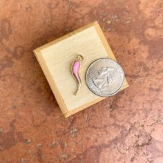 14KT yellow gold Corno/ Cornicello Italian Horn pendant charm with pink enamel. You can wear this pendant TWO WAYS! Wear the front side with the pink or wear it on the back with a polished-gold finish! Length: 23mm not including bail Width: 5.5mm Weight: 1.1 grams Hollow + Lightweight Stamped 14k on inside of bail Can fit up to 3.5mm wide chain No chain included Reversible pendant Yellow Gold Enamel Charms For Gift, Pink Gold Pendant Jewelry With Charms, Pink Enamel Heart Pendant Jewelry, Pink Enamel Jewelry With Charms, Pink Enamel Charms Jewelry, Pink Enamel Charms For Gifts, Pink Initial Pendant Jewelry Gift, Rose Gold Enamel Charms Jewelry, Pink Enamel Pin For Gifts