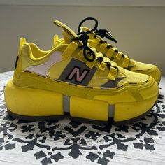 Purchased From Stockx, Box Not Included. Worn But Still In Great Condition! No Damage! Memory Foam Soles. Size 5.5 Men’s But Fits A Women’s 7. New Balance Round Toe Platform Sneakers For Streetwear, New Balance Platform Sneakers For Streetwear, New Balance Streetwear Platform Sneakers, Yellow Platform Sneakers For Streetwear With Rubber Sole, Yellow Sporty Lace-up Platform Sneakers, Sporty Yellow Lace-up Platform Sneakers, New Balance Yellow Sneakers For Streetwear, Yellow High-top Sporty Platform Sneakers, Yellow Slip-on Custom Sneakers, Sporty Style