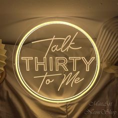 a neon sign that says talk thirty to me