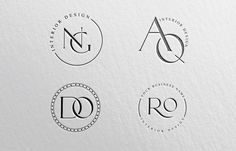 three logos for an interior and furniture company