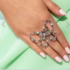 Dotted In Iridescent And Colorful Rhinestones, An Oversized Silver Butterfly Flutters Atop Airy Silver Bands, Resulting In A Dazzling Statement Piece. Features A Stretchy Band For A Flexible Fit. Due To Its Prismatic Palette, Color May Vary. Bundle Several Items & Save Packaged Well No Worries! Smoke Free Home *Poshmark Fee Included In Price. #New #Paparazzi #Jewelry #Blinglife Party Jewelry With Rhinestones In Butterfly Shape, Party Jewelry With Rhinestones And Butterfly Shape, Butterfly Shaped Party Jewelry With Rhinestones, Butterfly-shaped Party Jewelry With Rhinestones, Butterfly-shaped Rhinestone Party Jewelry, Elegant Silver Butterfly Ring For Party, Blue Butterfly Jewelry For Party, Elegant Butterfly Ring For Parties, Silver Bands