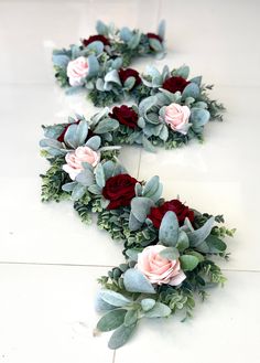 two rows of flowers are arranged on the floor