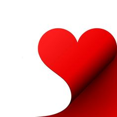 a red paper heart on a white background