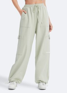 Embrace roomy wide legs and a stretchy fit for ultimate comfort, paired with a flattering high waist for added style. Whether it's grocery runs, lazy Sundays, or a casual hangout, these joggers have you covered in relaxed elegance. Full Length Drawstring Bottoms For Leisure, Comfortable Relaxed Fit Wide Leg Pants With Drawstring, High Waist Relaxed Fit Comfortable Pants, Comfortable High-waist Pants With Relaxed Fit, Comfortable High-waist Relaxed Fit Pants, Comfortable High Waist Relaxed Fit Pants, Relaxed Baggy Pants With Drawstring, Relaxed Baggy Drawstring Pants, Green Cargo Pocket Pants For Loungewear