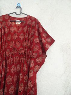 "Its  a pure hand block print and pure cotton material kaftan . It is made of 100 % cotton material . Great for summers. Size -  1---FIRST SIZE -----       WIDTH --      60 INCH        LENGTH --   57 INCH         NECK --        8 INCH         If any alteration is required please contact seller.        Pure cotton fabric. 2---SECOND SIZE ------       WIDTH --    70 INCH       LENGTH--   57 INCH        NECK --       8 INCH        If any alteration is required please contact seller.       Pure cott Festival V-neck Kaftan With Block Print, Festival Block Print V-neck Kaftan, Festival V-neck Block Print Kaftan, Summer Printed Red Kurta, Red Printed Kurta For Summer, Cotton Kaftan For Beach Festivals, Red Bohemian Maxi Kurta, Red Maxi Length Kaftan For Festivals, Red Kaftan For Beach Festivals