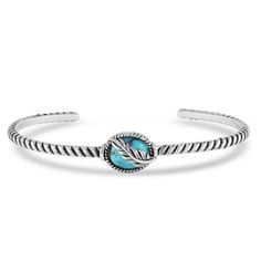 Carry a reminder of what is important to you with the Worlds Feather Turquoise Bracelet. A simple antiqued silver tone rope creates the cuff. At the top of the bracelet is an oval turquoise stone. Laying overtop of the turquoise stone is an antiqued feather that looks like it is floating in the sky. One size fits most. Stone color will vary. A cuff bracelet fits over your wrist. Item has a silver finish. Floating In The Sky, Silversmith Jewellery, Turquoise Bracelet Cuff, Turquoise Cuff, Broken Chain, Women Accessories Jewelry, Turquoise Stone, Post Earrings, Cuff Bracelet