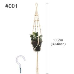 a potted plant hanging from a macrame with a white hanger attached to it