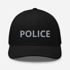 a black police hat with the word police printed on it's front and back