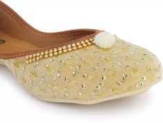 Punjabi Jutti Indian bridal khussa ethnic Bellies flat US Size 6-11 Cream Star This product data sheet is originally written in English. Adore Ambience Shoes for that in-vogue blend of modern and ethnic look which creates an aura of its own. They have been designed by the award winning craftsmen belonging to Rajasthan (India) who follow the rich tradition of exclusive hand embroidery unique to every pair. Key Features · Wedding/Party Range for an awe-inspiring Royal Look · Ideal For Weddings and Marriage Parties · Material: Faux Leather · Lifestyle: Ethnic,Contemporary · Closure Type: Slip On Quality and Customer Satisfaction Ambience is a renowned house engaged in field of designer Handicrafts through well-trained Artisans and craftsmen. Ambience is a perfect blend of tradition and contem Bridal Khussa, Embroidery Unique, Punjabi Jutti, Royal Look, Ethnic Looks, Rajasthan India, White Flats, Indian Bridal, Awe Inspiring