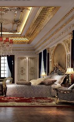 an ornate bedroom with chandelier, couch and bed in the middle of it