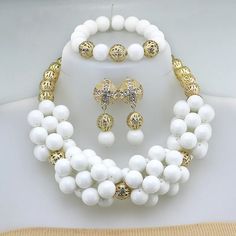 Enhance your bridal look with this classic Nigerian Wedding Bridal Jewelry. The African crystal beads jewelry set adds a touch of elegance and cultural significance to your wedding ensemble, creating a timeless and beautiful look.