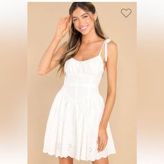 This Soft Eyelet Detailed Mini Has An Effortless Summertime Appeal! Nwt And No Flaws; Never Worn. This Dress Features An Elastic Scoop Neckline With A Self-Tie At The Front, Adjustable Self-Tie Straps, Boning In The Bust, A Corset-Shaped Waist, A Zipper In The Back, Scalloped-Edge Detailing Along The Bottom Hem, And Eyelet Detailing Throughout. 100% Cotton Hand Wash Cold Lined 100% Rayon Imported Measurements( Laying Flat): 31” Length 14” Across Waist 16” Across Chest From Armpit To Armpit From Sorority Rush Dresses, Rush Dresses, Red Dress Boutique, Eyelet Dress, White Eyelet, Little White Dresses, Event Dresses, Cami Dress, Corset Dress