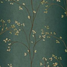 the wallpaper is green and gold with white flowers on it's branches in front of a blue background