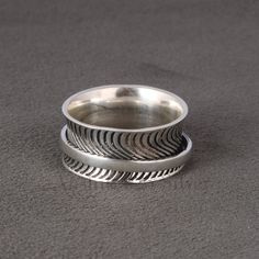 Plain Silver Spinner Ring- Fidget Ring- Designer Handmade Ring- 925 Sterling Silver Ring- Worry Ring- Meditation Ring- Gifted Ring.    Product & Gemstone Detail:  Metal : -  925 Sterling Silver Style : - Spinner Ring  Color: Silver  This Product can be gifted on the following Occasions:- Birthday Gift, Anniversary Gift, Wedding Gift, Baby Shower Gift, Graduation Ceremony, Friendship Day Gift, Daughter's Day Gift, Mother's Day Gift, Valentine's Day Gift, Christmas Gift, Thanks Giving Day NOTE: Al Friendship Day Gifts, Meditation Ring, Daughters Day, Worry Ring, Fidget Rings, Meditation Rings, Silver Spinner Rings, Hand Ring, Yellow Gold Jewelry