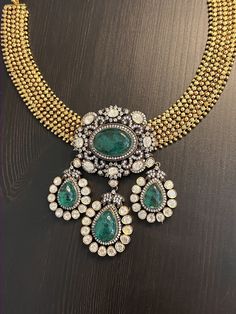 Statement Necklace & Earring set with diamante and semi-precious stones is sure to make heads turn! Beautiful, handcrafted statement necklace is much sought after this festive season, Classic with a modern Twist. Festive Diamond Necklaces With Jewels, Elegant Silver Kundan Necklace, Festive Diamond Necklace With Jewels, Elegant Kundan Necklace With Detachable Pendant For Festive Occasions, Elegant Kundan Necklace For Festivals, Festive Diamond Jeweled Necklaces, Festive Diamond Necklace With Stones, Festive Diamond Jewelry With Jewels, Elegant Emerald Necklace With 17 Jewels For Festivals