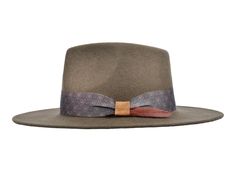 The Gypsy Hat is the perfect option for weekend adventures in the mountains, taking to it a concert, or just looking great while roaming around the city. Handcrafted by Ecuadorian Artisans, the hat will protect you from the sun, keep you warm and keep you looking great. Moreover, you can take it on the plane since it rolls. Country Style Wide Brim Top Hat For Outdoor, Bohemian Brown Hat For Outdoor, Artisan Wide Brim Winter Fedora, Country Style Hat With Flat Crown For Outdoor, Country Style Flat Crown Hat For Outdoor, Winter Outdoor Top Hat With Short Brim, Bohemian Fedora Felt Hat For Outdoor, Bohemian Fur Felt Fedora With Flat Brim, Bohemian Short Brim Felt Hat For Outdoor