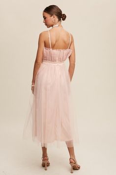 Elegant and versatile, the Frill Tulle Maxi Dress features a removable and adjustable shoulder strap, zip closure, and raw hem for a modern touch. Perfect for special occasions or romantic evenings.- Model is 5' 7.5" 33-24-34 and wearing a size SmallFabric Contents: Self: 100% PolyesterLining: 100% Polyester Size Measurement (inch): S: 15.5 (Bust), 13.5 (Waist) 45.0 (Length) M: 16.0 (Bust), 14.0 (Waist), 45.5 (Length) L: 16.5 (Bust), 14.5 (Waist), , 46.0 (Length) Tulle Midi Dress, Tulle Maxi Dress, Silhouette Dress, Plus Size Swimwear, China Fashion, Sheer Fabrics, Classic Silhouette, Dress Romper, Print Pattern