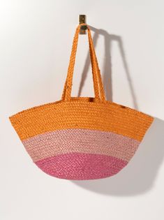 Add a pop of color to your summer accessories with Shiraleah’s Liza Tote. This tote features a multi-color stripe pattern upon a woven braided texture, making it the perfect warm weather bag. Measuring L 23" x W 6" x H 12.5", and made from jute, the Liza Tote is equipped with double handles, perfect for carrying all your essentials. Pair with other items from the Shiraleah collection to complete your look! Color: Sunset L 23" X W 6" X H 12.5"; Hnd 11" Material: Jute Double Shoulder Straps Made I Striped Woven Bags For Shopping, Striped Woven Shopping Bags, Woven Striped Shopping Bags, Striped Woven Straw Bag, Casual Striped Woven Straw Bag, Striped Woven Rectangular Straw Bag, Rectangular Striped Woven Straw Bag, Striped Beach Bag With Braided Handles, Striped Woven Rectangular Beach Bag