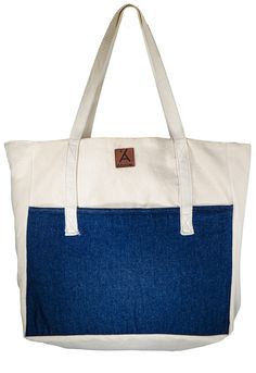 Here's a unique tote bag to complement your outfit. Our Above tote bag is spacious, high quality, affordable and stylish. It is made from 15-ounce cotton canvas and denim fabric. This bag is extra large in size. The handle is long and very convenient for over-the-shoulder carrying. This reusable organic cotton shoulder tote bag has a padded extensive exterior pocket and a zippered inside pocket for valuables. The bag is fully lined. It is super cute and lightweight. It is an excellent alternativ Unique Tote Bag, Camping Beach, Fabric Tote Bags, Denim Tote Bags, Fabric Tote, Denim Tote, School Library, Shoulder Tote Bag, Paper Bags