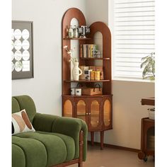 In the hustle and bustle of the city, seek a tranquil haven where your soul can rest. This vintage-styled deep brown corner cabinet, with its unique design and elegant aesthetics, adds a touch of extraordinary charm to your living space. The upper external display shelf resembles a miniature art gallery, cleverly incorporating a semicircular mirror that not only broadens the visual space but also adds a touch of classical elegance. Whether displaying your cherished collections or everyday trinke Retro Home Decor 1950s, Mid Century Study, Laminate Design, Wood Accent Cabinet, Display China, Unique Bookshelves, Angle Design, China Cabinets, Wood Accent