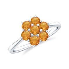 Product Details A timeless and elegant flower ring featuring a round-shaped orange sapphire beautifully set in a cluster prong setting. The stunning floral design enhances the beauty of this ring, which is crafted from solid gold. Product Information SKU SHP-RINGS0821190480 Width 11.8 mm Height 4.5 mm Weight 3.20 gm (Approximate) ORANGE SAPPHIRE INFORMATION No.of Stones 7 Pieces Total Weight 0.91 Carat (Approximate) Dimension(approx) Round-3X3 mm-7 Pcs Color Orange Cut Brilliant Shape Round Sett Elegant Hallmarked Orange Ring, Orange Round Jewelry With Accent Stones, Orange Fine Jewelry With Accent Stones, Orange Round Yellow Sapphire Jewelry, Elegant Round Orange Gemstones, Orange Cut, Cluster Engagement Ring, Orange Sapphire, Elegant Flowers