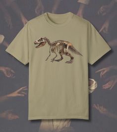 DESCRIPTION - T-REX FOSSIL - Tee - T-REX FOSSIL Museum of History and Science Graphic - Trendy y2k Graphic Tee PRODUCT DETAILS - Comfort Colors 1717 Unisex Crewneck Short Sleeve T-Shirt - Direct-To-Garment Printing Style - Crafted from 100% Cotton - Each Tee Features Garment-Dyed Fabric - Medium Fabric - Relaxed Fit - Double Need Stitching - Sew-In Twill Label CARE INSTRUCTIONS - ALWAYS WASH SEPARATELY TO AVOID BLEEDING ISSUES - We Strongly Recommend Washing These Garments Only with Like-Colored Dinosaur Aesthetic, Fossil Museum, Y2k Graphic Tees, Website Coming Soon, T Rex Dinosaur, Dinosaur Shirt, Tyrannosaurus Rex, T Rex, Comfort Colors